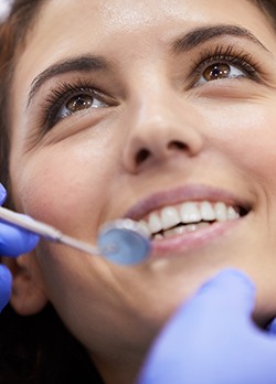 Woman in dental chair about to undergo dental exam