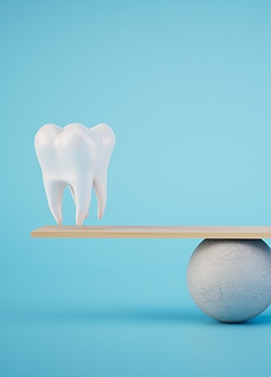 A 3D illustration of gold coins and an enlarged tooth on a balance beam