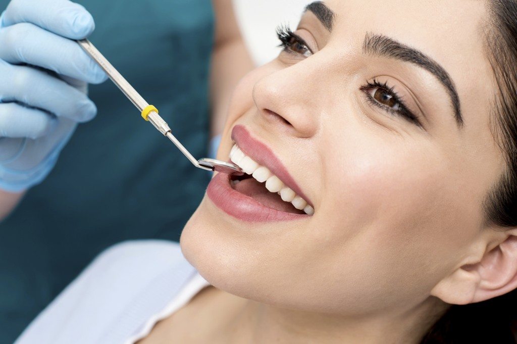 Smiling patient in dental chair