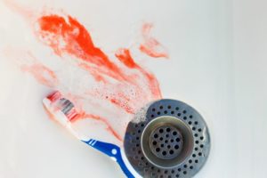 toothbrush blood in sink